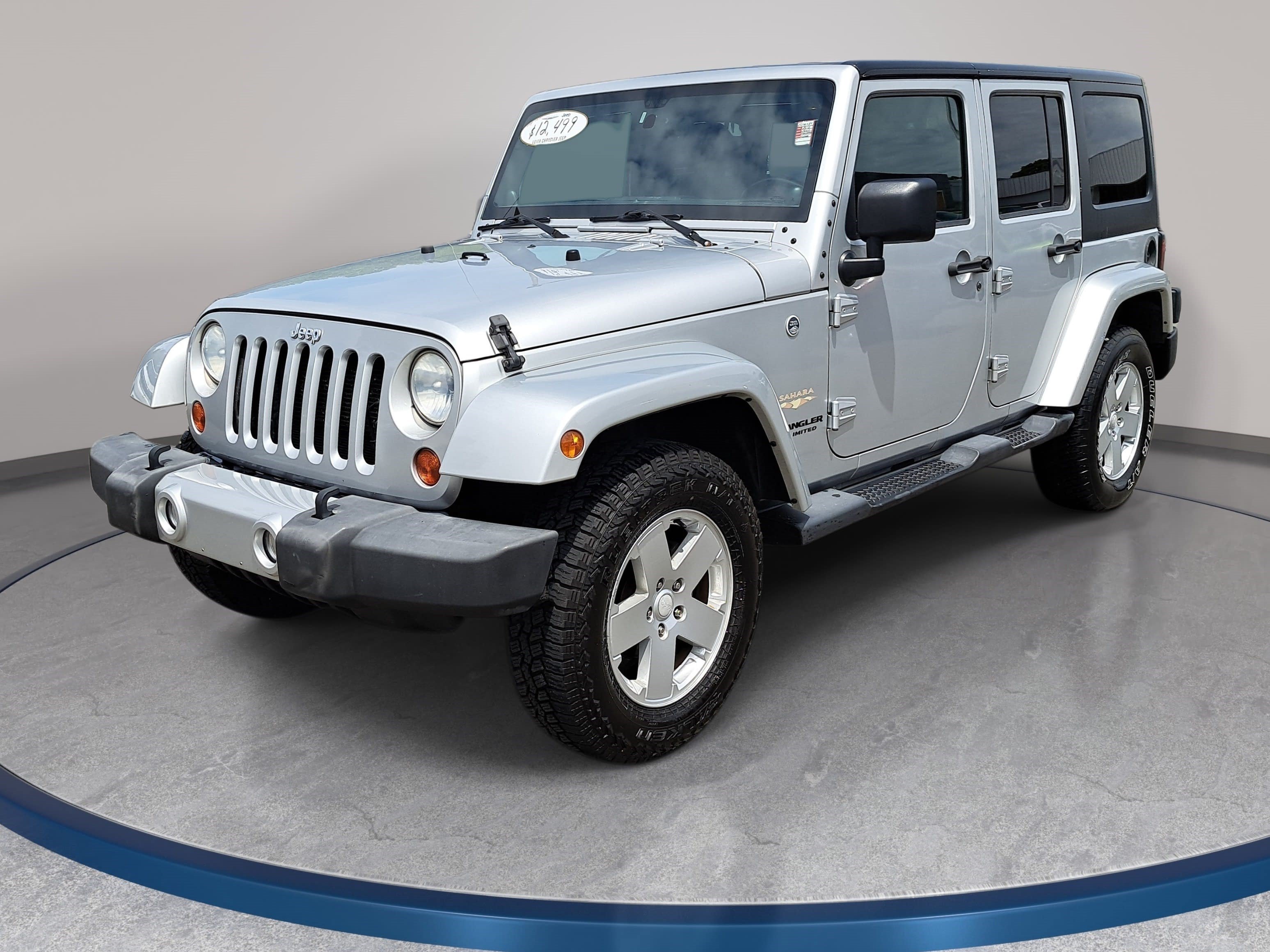 Used 2012 Jeep Wrangler Unlimited Sahara w/ Dual Top Group AWD/4WD image 1