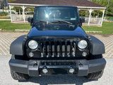Used 2014 Jeep Wrangler Unlimited Sport image 2