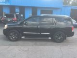 Used 2014 Nissan Armada Platinum w/ 2nd Row Captain Seat Package image 2