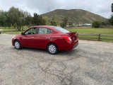 Used 2015 Nissan Versa SV image 2