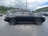 Used 2019 Nissan Armada Platinum w/ Captain's Chairs Package image 2