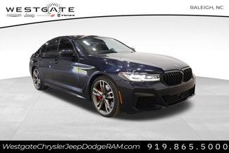 Used 2021 BMW M550i xDrive w/ Executive Package image 1