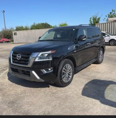 Used 2021 Nissan Armada SL w/ Captain's Chairs Package image 1