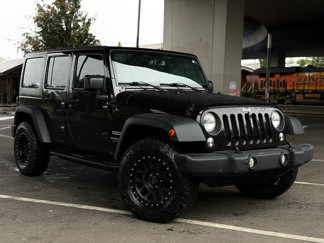 Used 2018 Jeep Wrangler Unlimited Sport S image 1