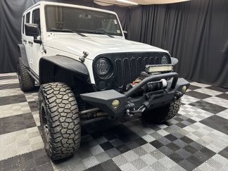 Used 2015 Jeep Wrangler Unlimited Sahara image 1