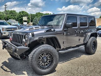 Used 2016 Jeep Wrangler Unlimited Sahara w/ Connectivity Group image 1