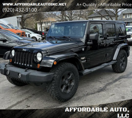 Used 2013 Jeep Wrangler Unlimited Sahara w/ Dual Top Group image 1