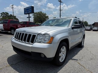 Used 2010 Jeep Grand Cherokee Laredo image 1