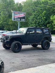 Used 2012 Jeep Wrangler Unlimited Sahara image 1
