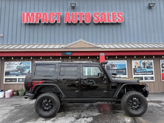 Used 2016 Jeep Wrangler Unlimited Sahara image 1
