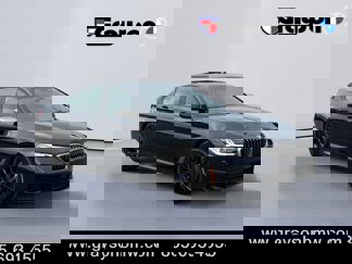 Used 2023 BMW M550i xDrive w/ Executive Package image 1
