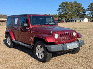 Used 2012 Jeep Wrangler Unlimited Sahara w/ Dual Top Group image 1