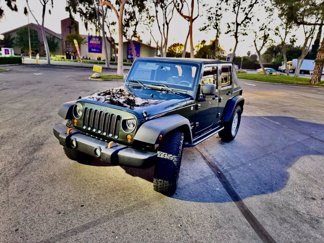 Used 2011 Jeep Wrangler Unlimited Sport image 1