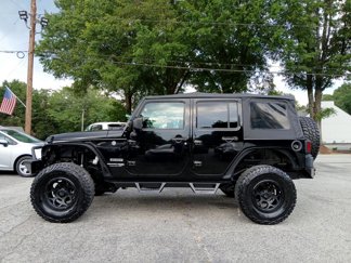 Used 2018 Jeep Wrangler Unlimited Sport S image 1