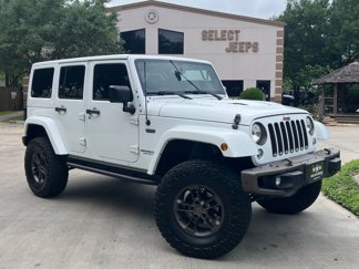 Used 2016 Jeep Wrangler Unlimited Sahara image 1
