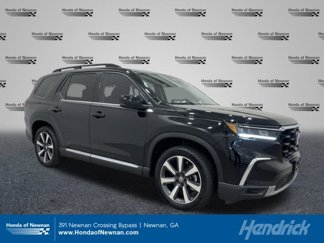 Certified 2025 Honda Pilot Touring image 1