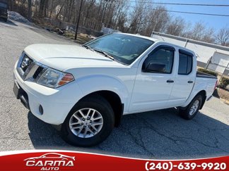 Used 2014 Nissan Frontier SV image 1