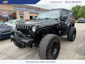 Used 2021 Jeep Wrangler Sport image 1