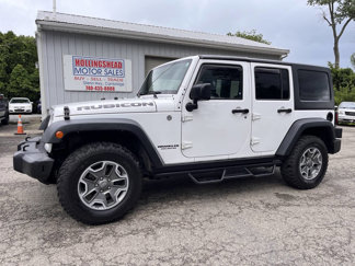 Used 2013 Jeep Wrangler Unlimited Rubicon w/ Dual Top Group image 1