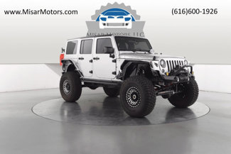 Used 2011 Jeep Wrangler Unlimited Sport w/ Black Appearance Group image 1