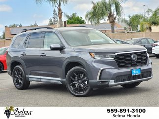 New 2025 Honda Pilot Touring image 1