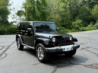 Used 2011 Jeep Wrangler Unlimited 70th Anniversary w/ Dual Top Group image 1