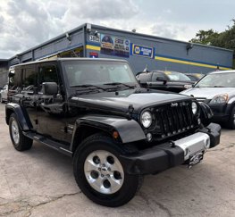 Used 2015 Jeep Wrangler Unlimited Sahara image 1