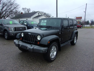 Used 2011 Jeep Wrangler Unlimited Sport image 1