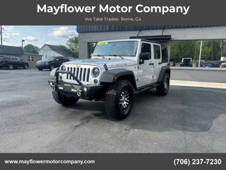 Used 2010 Jeep Wrangler Unlimited Rubicon w/ Dual Top Group image 1