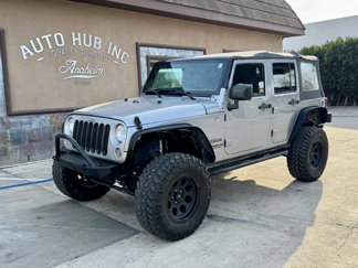 Used 2015 Jeep Wrangler Unlimited Sport image 1