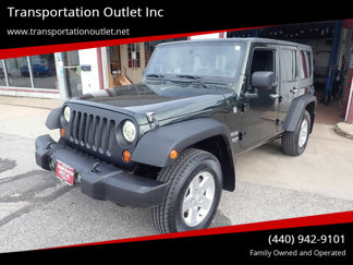 Used 2012 Jeep Wrangler Unlimited Sport image 1