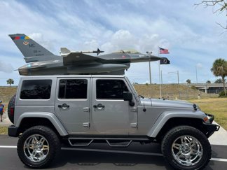 Used 2014 Jeep Wrangler Unlimited Sahara w/ Max Tow Package image 1