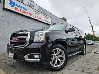 Used 2016 GMC Yukon XL SLT w/ Open Road Package image 1