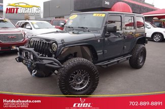 Used 2017 Jeep Wrangler Unlimited Sport w/ Mopar Black Appearance Group image 1