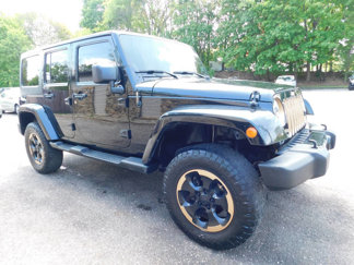 Used 2014 Jeep Wrangler Unlimited Sahara image 1