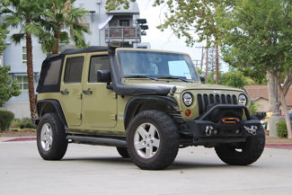 Used 2013 Jeep Wrangler Unlimited Sport image 1
