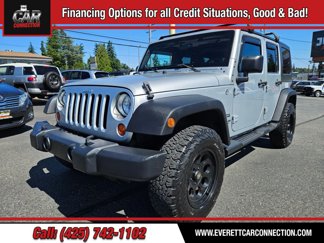 Used 2012 Jeep Wrangler Unlimited Sport image 1