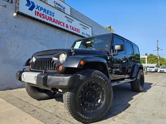 Used 2012 Jeep Wrangler Unlimited Sahara w/ Connectivity Group image 1