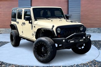 Used 2011 Jeep Wrangler Unlimited Sport image 1