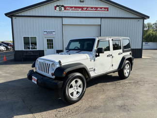 Used 2012 Jeep Wrangler Unlimited Sport image 1
