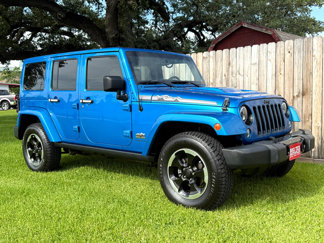 Used 2014 Jeep Wrangler Unlimited Sahara image 1