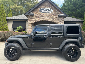 Used 2015 Jeep Wrangler Unlimited Sport image 1