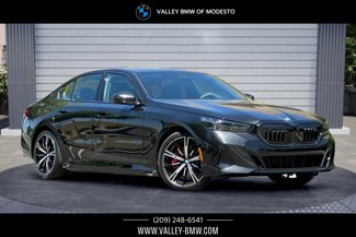 New 2026 BMW 550e xDrive image 1