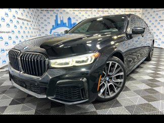 Used 2022 BMW 740i xDrive w/ M Sport Package image 1