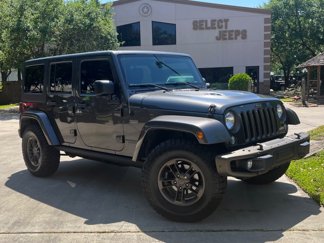 Used 2016 Jeep Wrangler Unlimited Sahara image 1