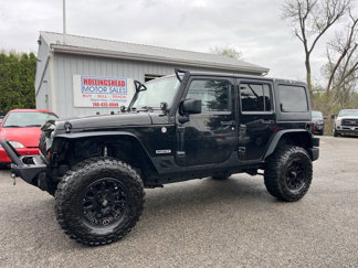 Used 2013 Jeep Wrangler Unlimited Sport image 1