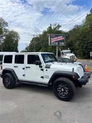 Used 2015 Jeep Wrangler Unlimited Sport image 1