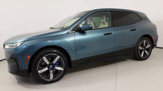 Used 2025 BMW iX xDrive50 w/ Sport Package image 1