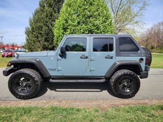 Used 2015 Jeep Wrangler Unlimited Sport image 1