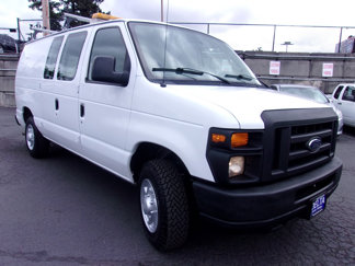 Used 2011 Ford E-150 and Econoline 150 w/ Commercial Cargo Van Pkg image 1